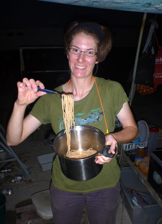 Laura with pot of spaghetti